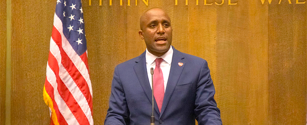 Mayor Quinton Lucas behind the podium